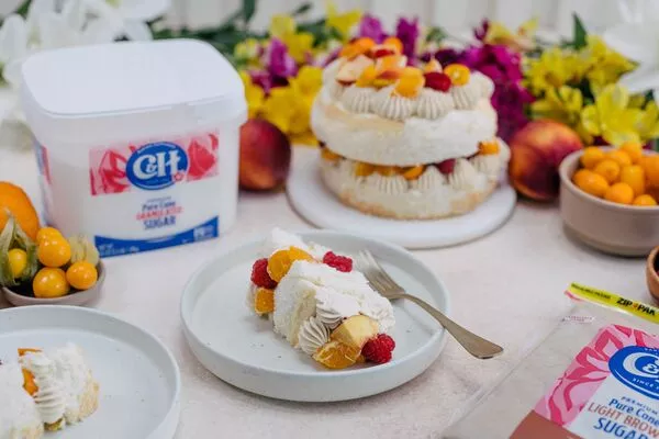 Angel Food Cake with Brown Sugar Buttercream & Fresh Fruit Garnish