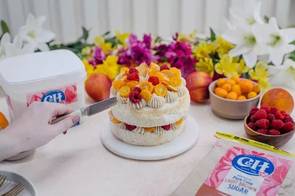 Angel Food Cake with Brown Sugar Buttercream & Fresh Fruit Garnish