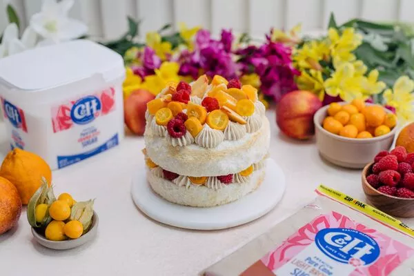 Angel Food Cake with Brown Sugar Buttercream & Fresh Fruit Garnish