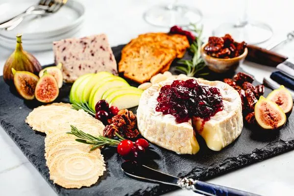 c&h light brown sugar cranberry sauce with baked brie and candied pecans