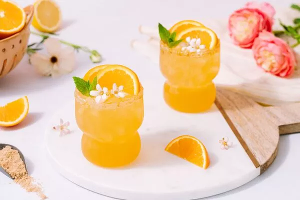 orange blossom whiskey smash with c&h light brown sugar