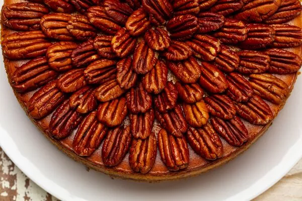 pumpkin pecan cheesecake made with c&h light brown sugar and granulated sugar