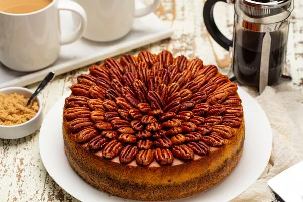 pumpkin pecan cheesecake made with c&h light brown sugar and granulated sugar