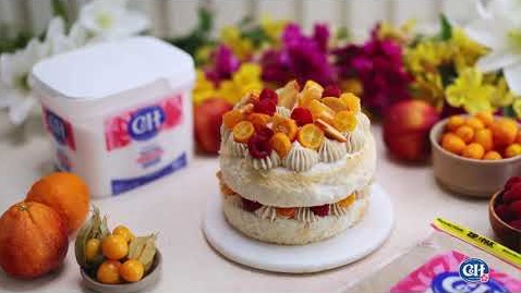 Angel Food Cake with Brown Sugar Buttercream & Fresh Fruit Garnish