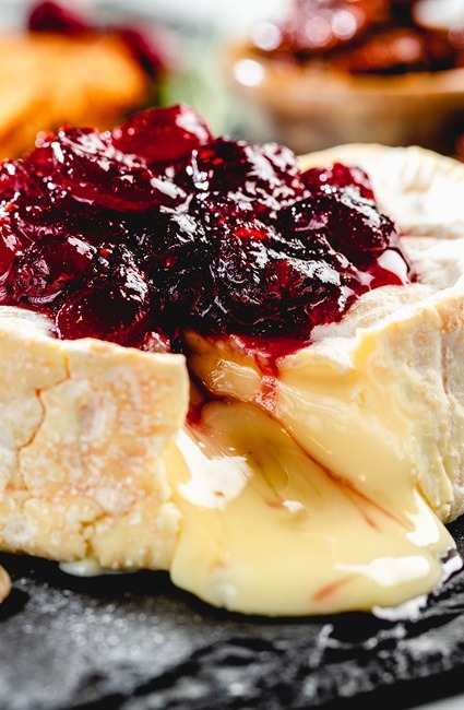 c&h light brown sugar cranberry sauce with baked brie and candied pecans