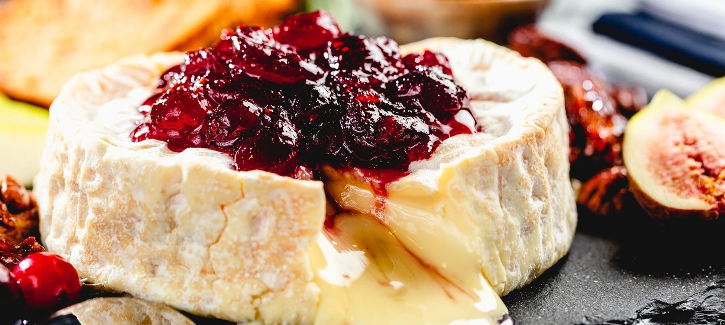 c&h light brown sugar cranberry sauce with baked brie and candied pecans