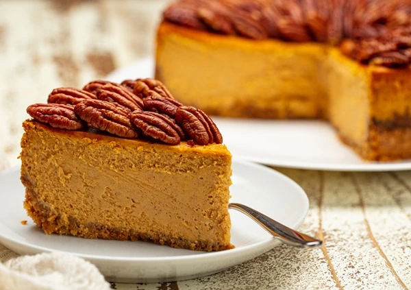 pumpkin pecan cheesecake made with c&h light brown sugar and granulated sugar