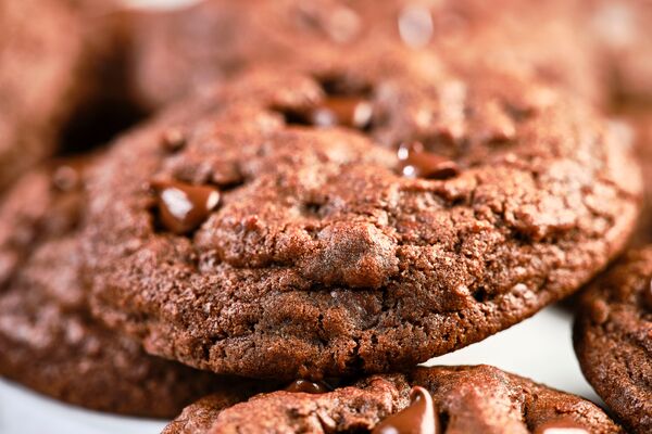 a close-up of a double chocolate chip cookie